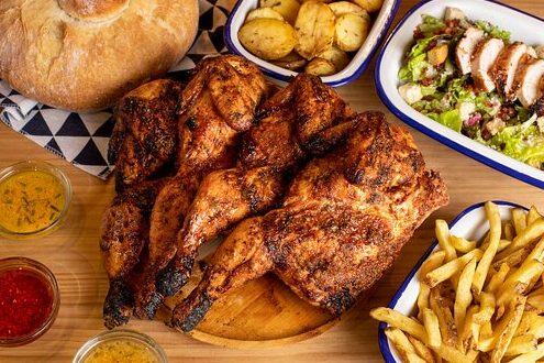 Asador De Pollos Puri